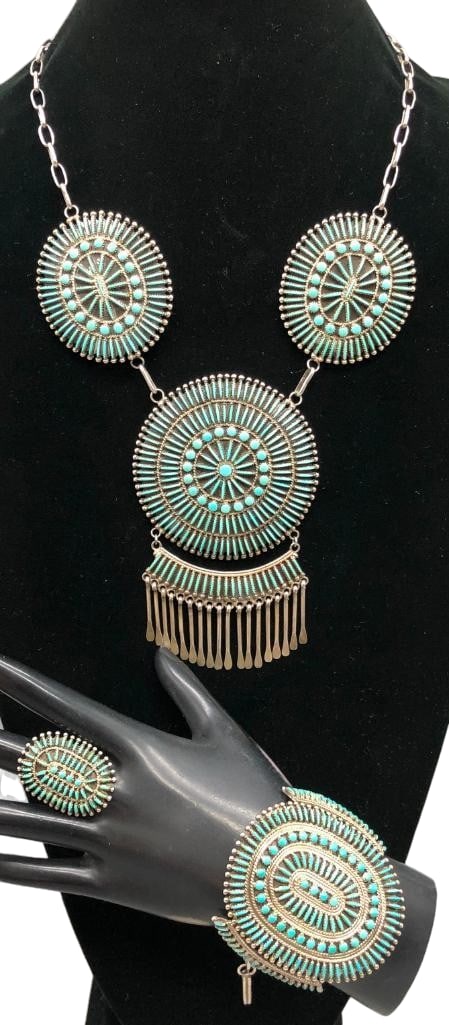Vintage Zuni Needlepoint Necklace, Bracelet And Ring: Offered here are a vintage Zuni needlepoint necklace, bracelet and ring set. Highlighting the bracelet, ring and necklace's three pendants are clusters of turquoise cabochons in needlepoint and do