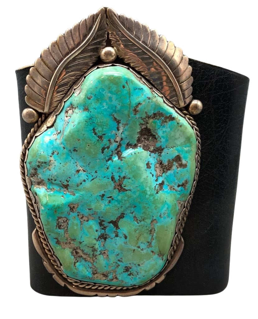 Monumental Sterling Silver And Turquoise Ketoh: Available here for your consideration is a monumental sterling silver and turquoise ketoh. This great ketoh has a large nugget style turquoise cabochon set in a scalloped silver bezel. Accenting the s