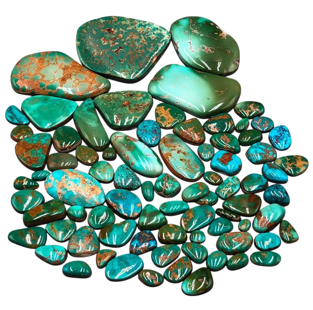 875 Carats of High Grade Turquoise Cabochons: Offered here for your consideration are 875 carats of high grade turquoise cabochons. This lot includes cut and polished turquoise cabochons in a variety of sizes and shapes. The colors range from sof