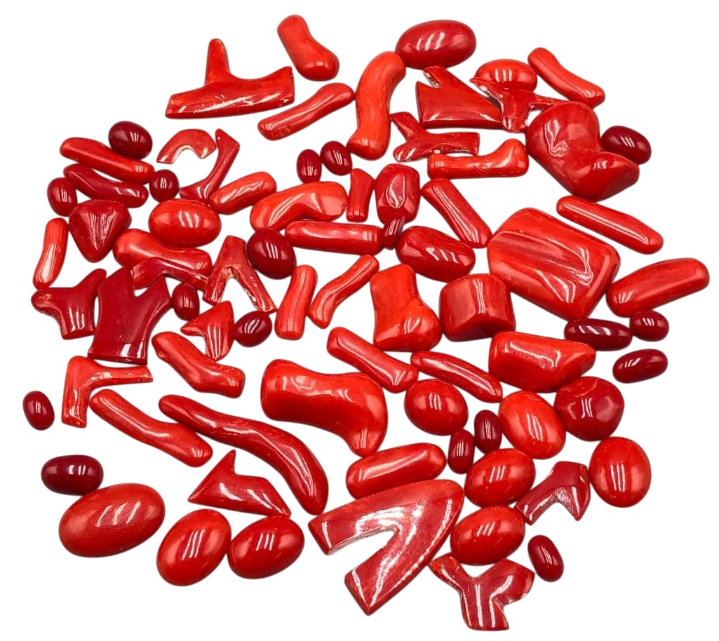 450 Carats of Natural High Grade Red Coral Cabochons: Offered here for your consideration are 450 carats of natural high grade red coral cabochons. This lot includes cut and polished red coral cabochons in a variety of sizes and shapes. These would look 