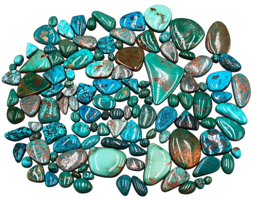 860 Carats of Turquoise Cabochons: Offered here for your consideration are 860 carats of turquoise cabochons. This lot includes cut and polished turquoise cabochons in a variety of sizes and shapes. The colors range from soft green to 
