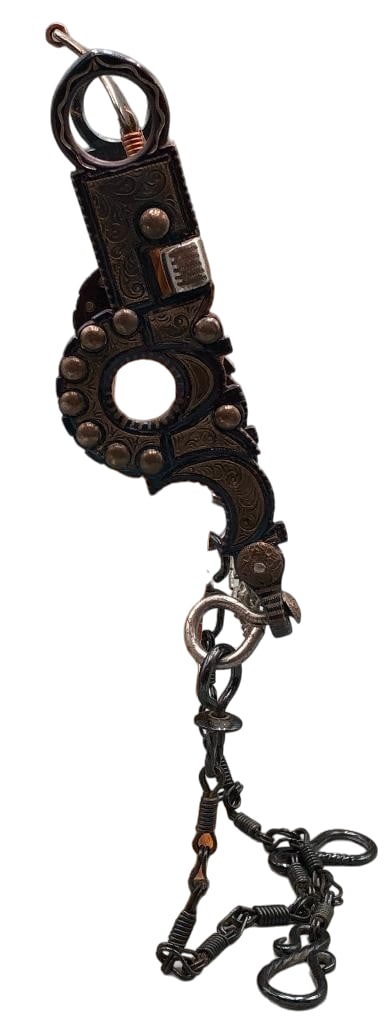 Like New Grijalva Spade Bit: Available here for your consideration is a like new Grijalva spade bit which features silver inlay designs on the cheeks. It is further accented with buttons. The bit has copper wrapped braces and rei