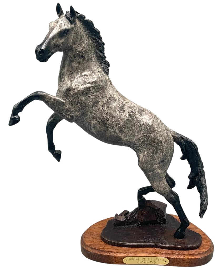 Looking For A Playmate A Bronze By Scott C. Kilby 3/18: Offered here for your consideration is "Looking For A Playmate" a bronze by Scott C. Kilby and it is number 3/18. This piece depicts a rearing horse and is mounted on a wooden base. This sculp