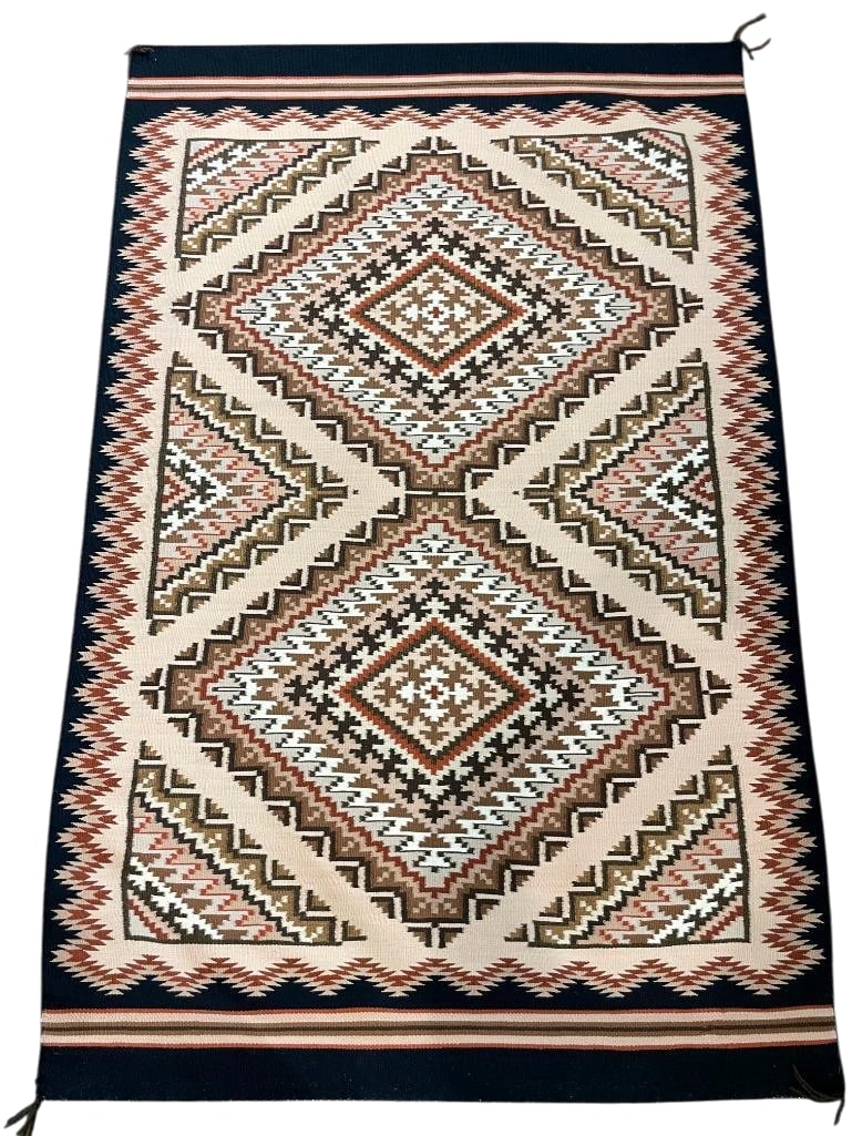 Burntwater Design Navajo Rug: For your bidding pleasure is a Burntwater design Navajo rug. This rug was woven with commercial wool and features diamond patterns in browns, rust, tan, and white. This weave is finished with a tan ba
