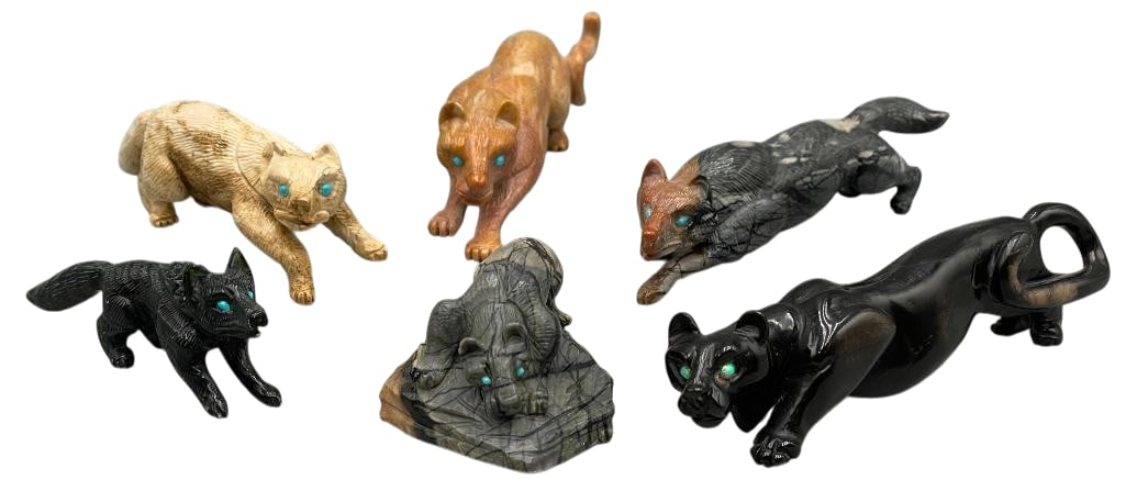 Six Zuni Carved Animal Fetishes By Dan Quam: Offered here for your consideration is a group of siz Zuni carved animal fetishes by Dan Quam. These carvings include wolves, mountain lions, a panther.They are made from a variety of stones including