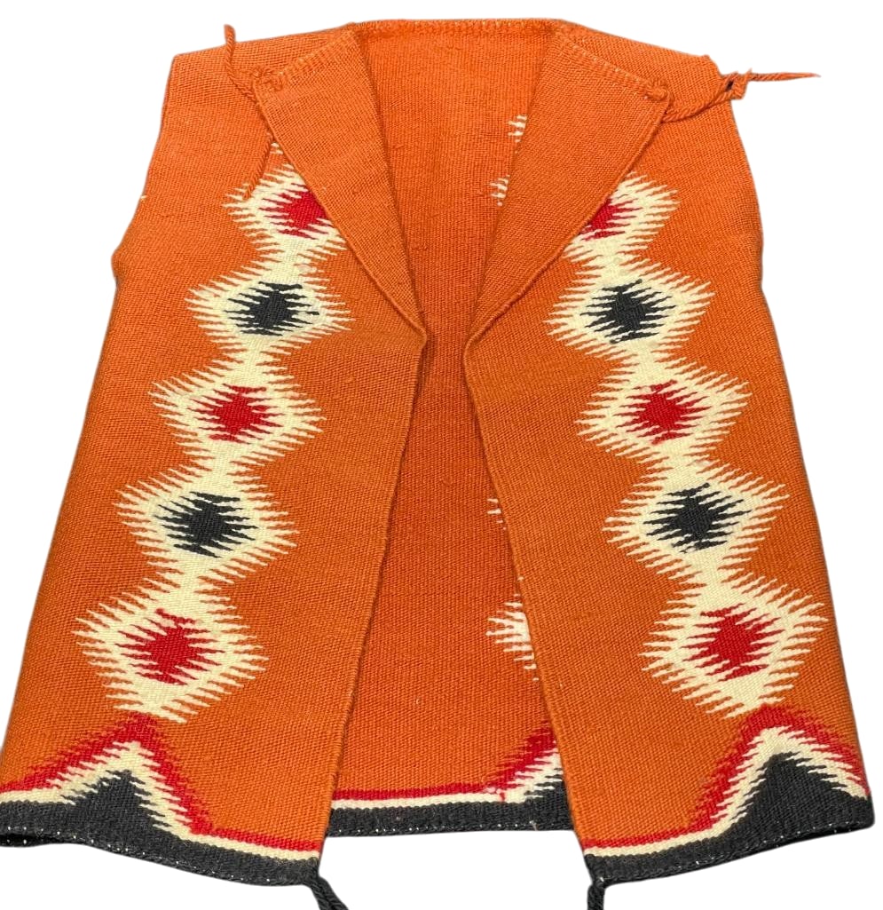 Navajo Textile Vest: Available here for your consideration is a Navajo textile vest. This vest is hand woven and sewn together made from a Navajo textile. It features serrated diamond patterns on the front and back in red