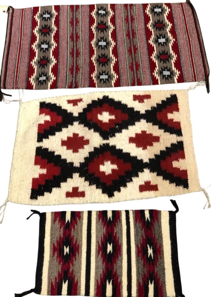 Group of Three Navajo Rugs: Available here for your consideration is a group of three Navajo rugs. This group contains two Chinle design weavings that feature banded design elements in red, grey, white, and black. These are both