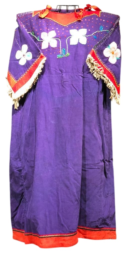 Plateau Beaded Dress: Offered here for your consideration is a Plateau beaded dress which features beautiful beadwork. The bright multicolored beads are sewn on in floral motifs on the shoulder and chest portion and upper 
