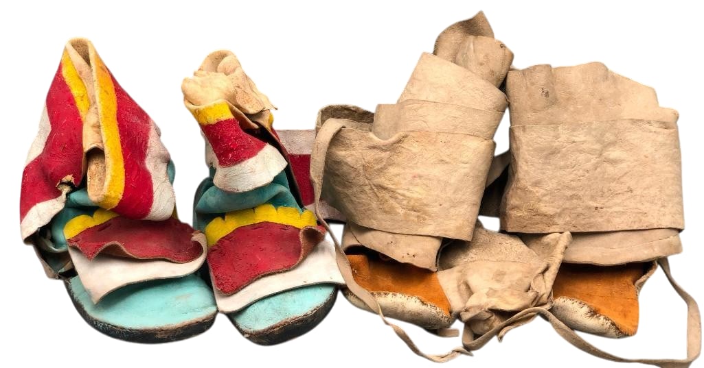Two Pairs of Vintage Pueblo Moccasins: Offered here for your consideration are two pairs of vintage Pueblo moccasins. They are constructed from leather hide with one pair painted in colors of red, white, yellow and blue. Add these moccasin