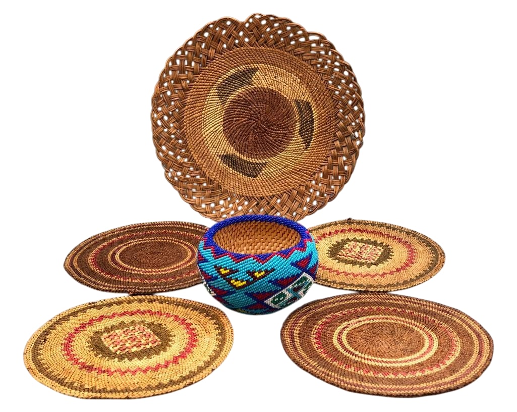 Older California Basketry Trays and a Beaded Paiute Basket: Offered here for your consideration is a group of early California basketry trays and a beaded Paiute basket. The coiled trays showcase geometric designs woven in natural, brown and red colors while t