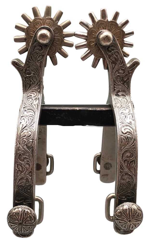 Garcia Marked Silver Mounted Spurs: Available here for your consideration is a pair of Garcia marked silver mounted spurs which are single mounted with engraved silver overlay designs along the outer heel band and shank. They have engra