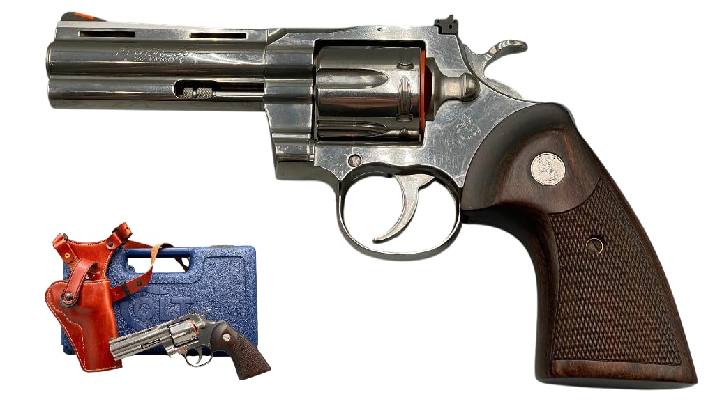 Colt Python 357 Python With Leather Galco Shoulder Holster: For your bidding pleasure is a Colt Python revolver chambered in .357 and it comes with a leather GALCO Shoulder Holster. This weapon features a stainless steel finish with a ventilated top rib on the
