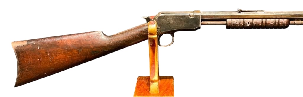 Winchester Model 1890 Slide Action .22 Caliber Rifle: For your bidding pleasure is a classic Winchester Model 1890 slide action .22 caliber rifle. This rifle is an iconic design by John Browning. This is a takedown model and removing the thumb screw allo
