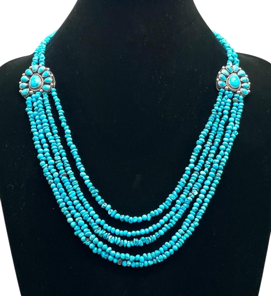 Sleeping Beauty Turquoise And Sterling Silver Beaded Necklace: Offered here for your consideration is a sleeping beauty turquoise and sterling silver beaded necklace. This piece features two pendants each highlighted with 10 Sleeping Beauty turquoise cabochons se