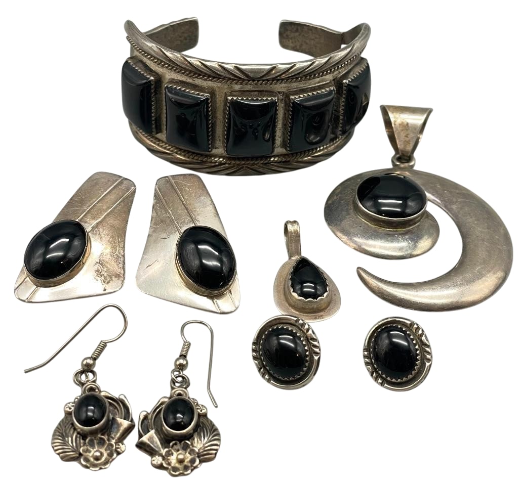 Group Of Sterling Silver And Onyx Jewelry: Offered here for your consideration is a group of sterling silver and onyx jewelry. Each piece features onyx cabochons set in silver bezels with silver accents. Motifs include hand stamped patterns, l