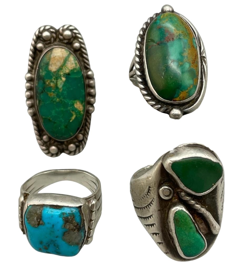 Four Antique Turquoise And Sterling Silver Rings: Offered here are four antique turquoise and sterling silver rings. These pieces are highlighted with blue or green turquoise cabochons set in silver bezels. Accenting the stones are twisted wires, sil