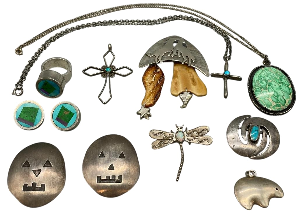 Group Of Miscellaneous Sterling Silver Jewelry Items: Offered here for your consideration is a group of miscellaneous sterling silver jewelry items. This lot showcases a matching ring and pair of earrings, four pins and four pendants. The sterling silver