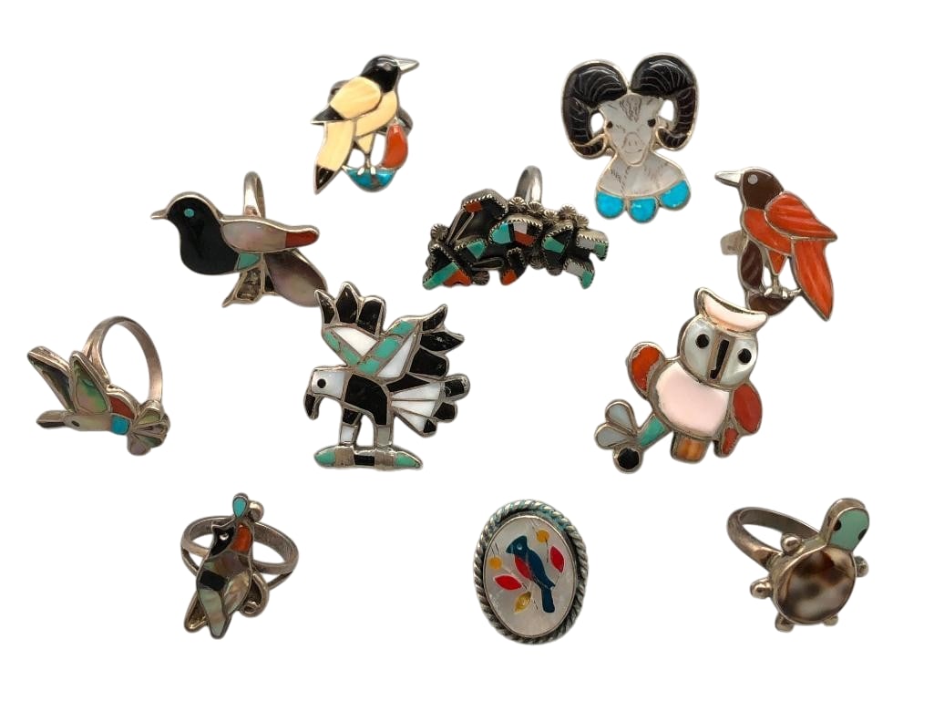 11 Vintage Zuni Multi Stone Inlay And Sterling Silver Rings: Offered here for your consideration are 11 vintage Zuni multi stone inlay and sterling silver rings. These pieces feature multi stone inlays with a variety of stones including turquoise, mother of pea