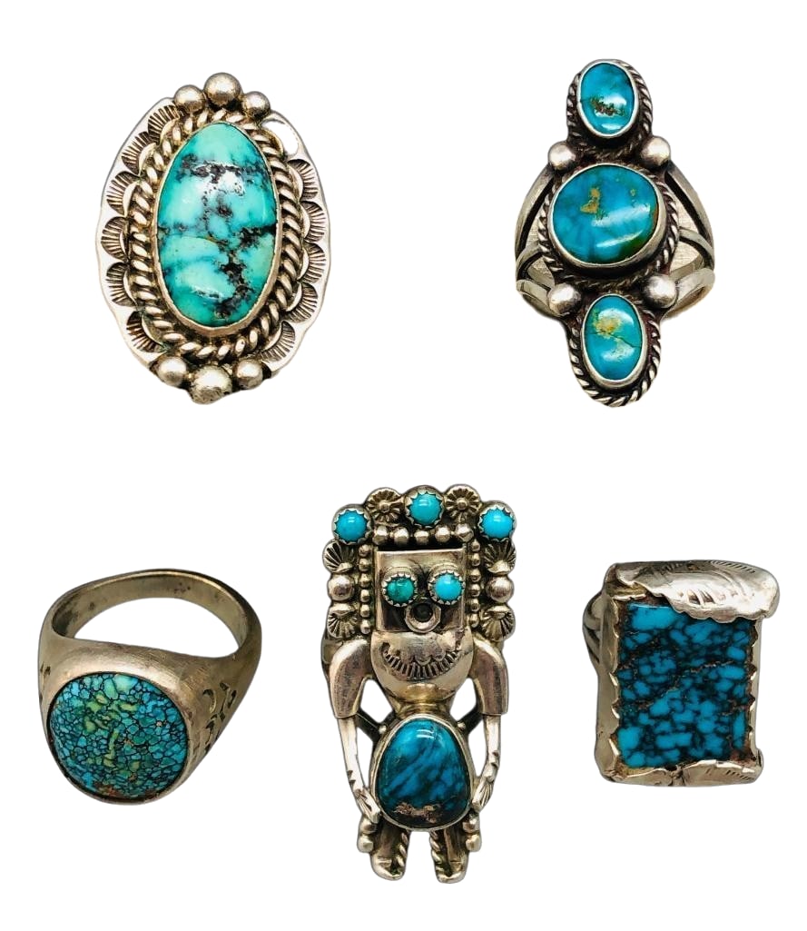 5 Vintage Sterling Silver And Turquoise Rings: Offered here for your consideration are five vintage sterling silver and turquoise rings. Each piece features turquoise cabochons set in silver bezels with one ring showcasing a Kachina design. Accent