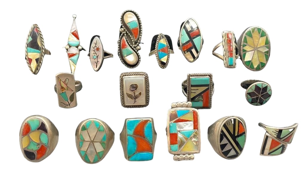18 Vintage Multi Stone Inlay And Sterling Silver Rings: Offered here for your consideration are 18 vintage multi stone inlay and sterling silver rings. The pieces feature multi stone inlays showcasing turquoise, coral, mother of pearl, onyx and others. *NO
