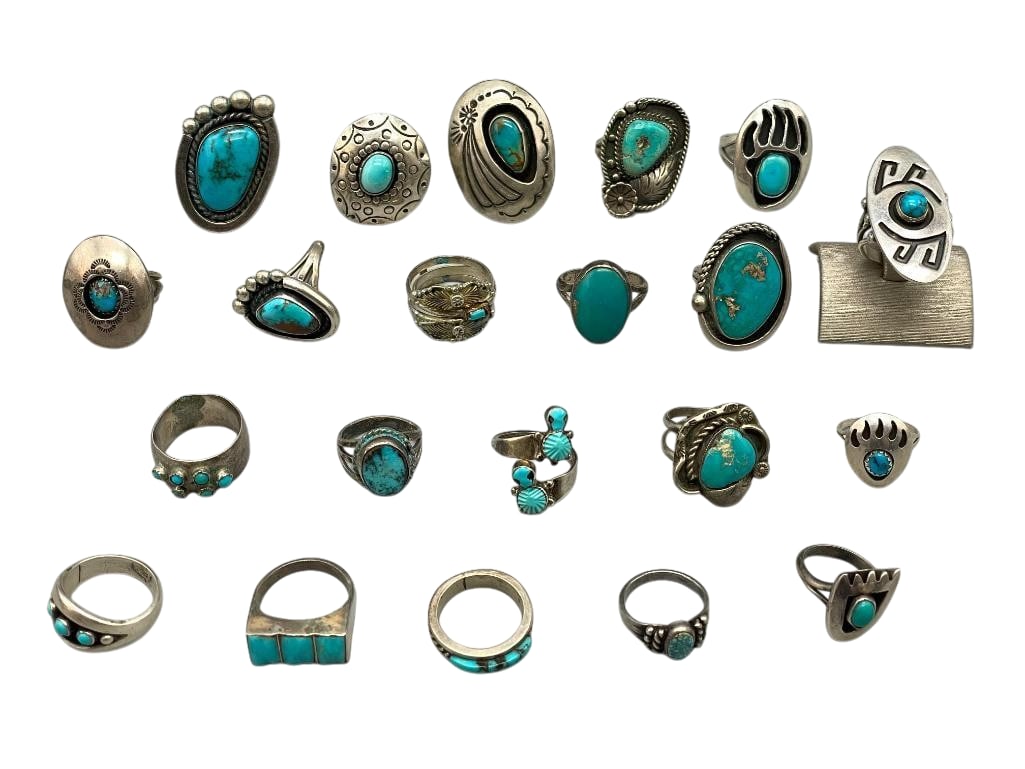 21 Vintage Turquoise And Sterling Silver Rings: Offered here for your consideration are 21 vintage turquoise and sterling silver rings. Most of the pieces feature turquoise cabochons set in silver bezels with silver accents. One ring showcases a tu