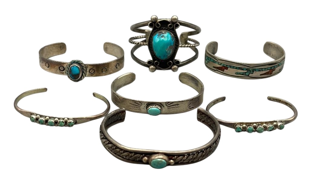 Seven Vintage Sterling Silver And Turquoise Bracelets: Available here for your consideration are seven vintage sterling silver and turquoise bracelets. The bracelets are highlighted with turquoise cabochons or turquoise chip inlay. Accenting the stones ar