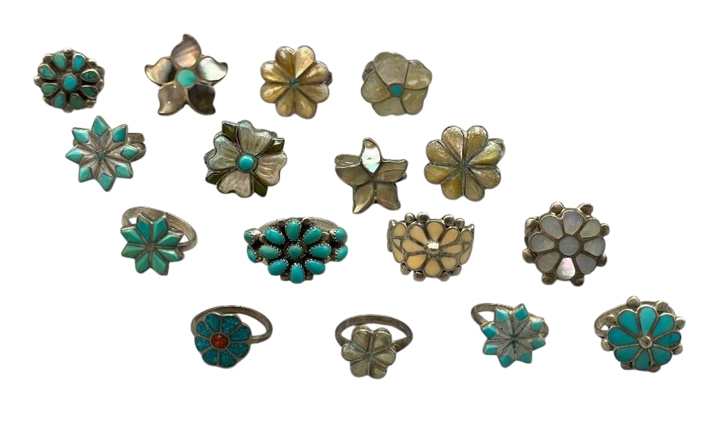 Group Of 16 Vintage Sterling Silver Rings With Various Settings: Offered here is a group of 16 vintage sterling silver rings with various settings. These pieces are each highlighted with a floral like design created with inlays or cabochons of turquoise, mother of 