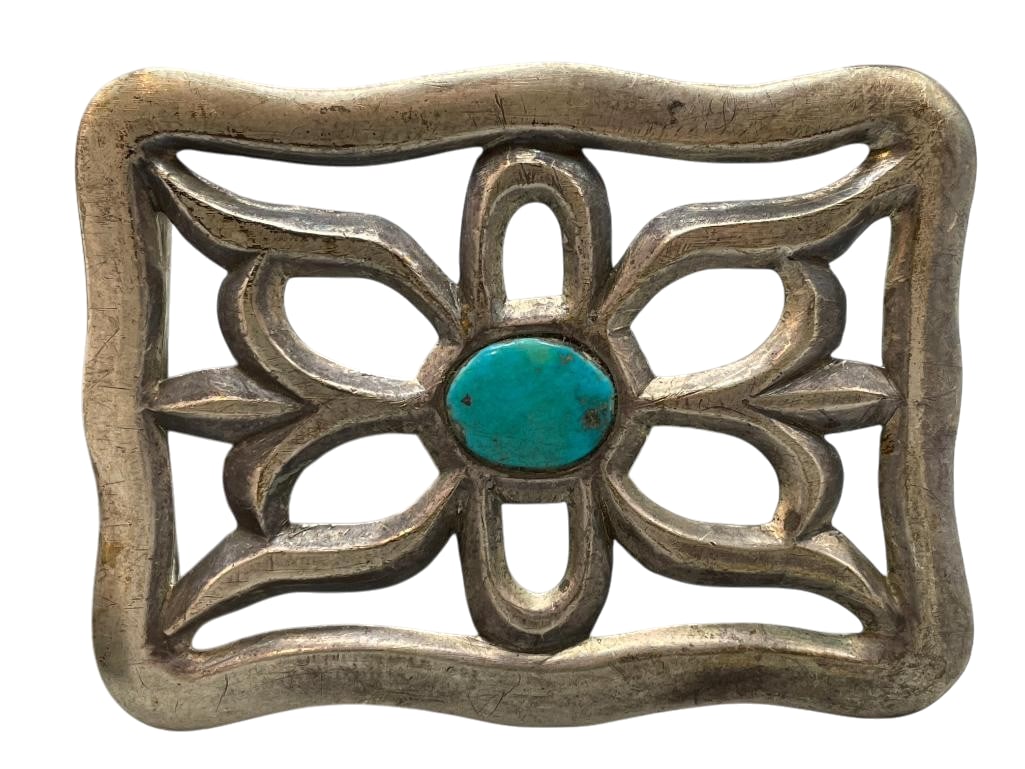 Vintage Sterling Silver Sandcast And Turquoise Belt Buckle: Offered here for your bidding enjoyment is a vintage sterling silver sandcast and turquoise belt buckle. This buckle has a nice sandcast design accented with a turquoise cabochon in the center. The sa