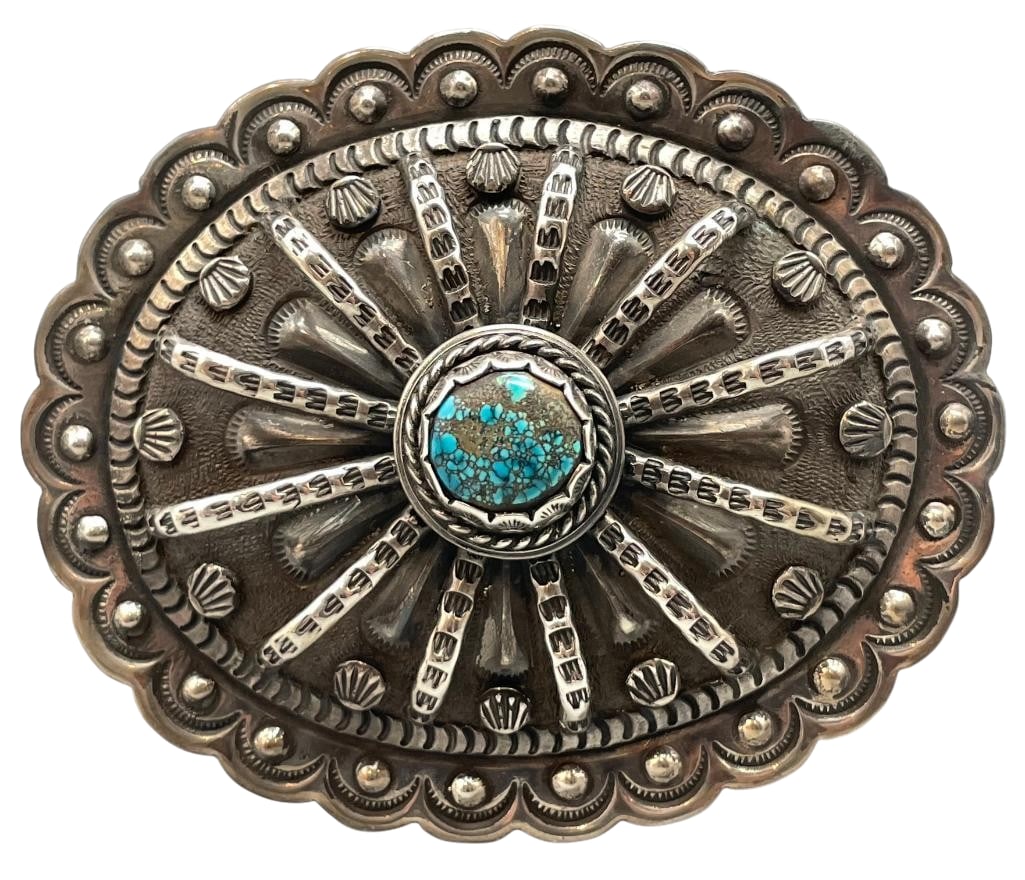 Great Sterling Silver And Turquoise Belt Buckle by Federico Jimenez: Available here in this lot is a great sterling silver and turquoise belt buckle by Federico Jimenez. This belt buckle features a great turquoise cabochon with nice webbing set in a scalloped silver be
