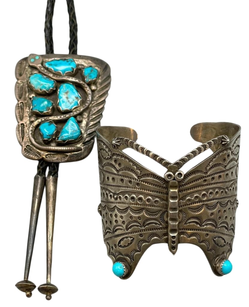 Sterling And Turquoise Bolo By Juan Calavaza With Butterfly Theme Sterling Bracelet By Kenneth Jones: Offered in this lot is a sterling silver and turquoise bolo by Juan Calavaza with a butterfly theme sterling silver bracelet by Kenneth Jones. This slide has seven turquoise cabochons set in sawtooth 