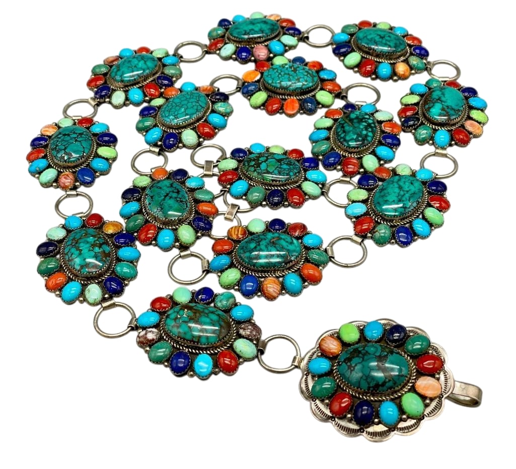 Sterling Silver And Multi Stone Link Concho By Robert Shakey: Offered here for your consideration is a sterling silver and multi stone link concho belt by Robert Shakey. The belt has 14 oval conchos and a matching buckle. Each highlighted with a cluster of turqu