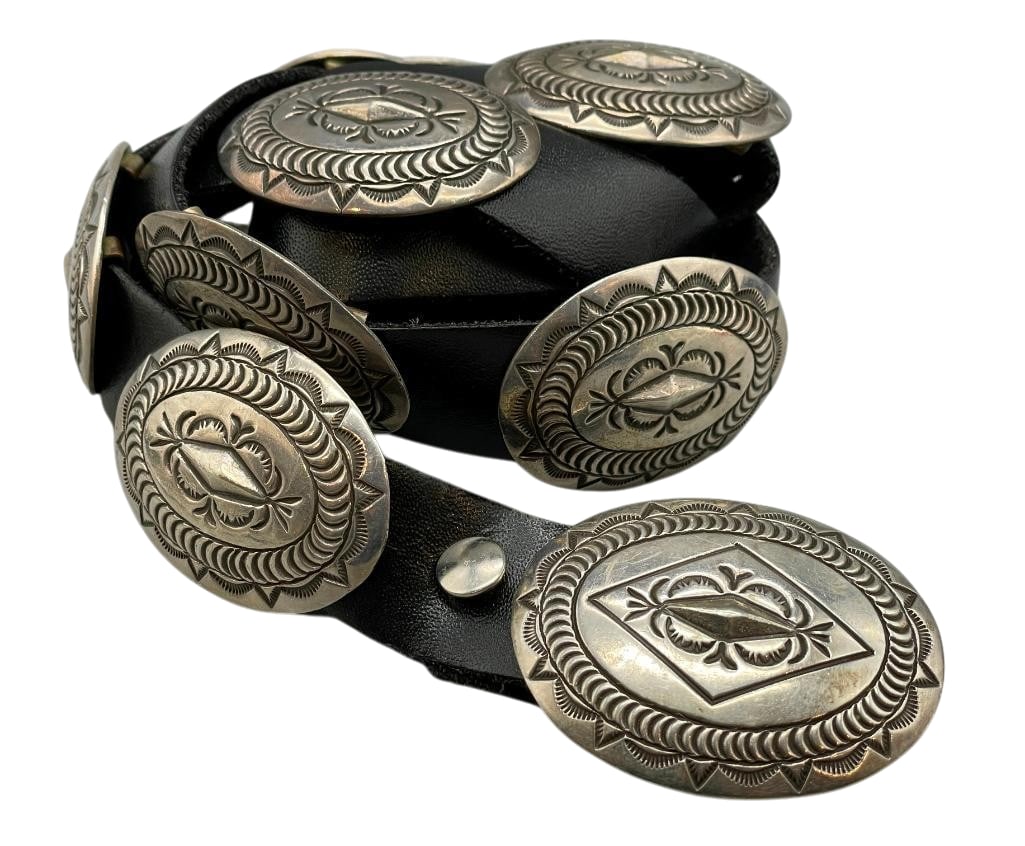 Stamped Sterling Silver Concho Belt Perfect Size For Belt Loops: Offered here for your consideration is a stamped sterling silver concho belt perfect size for belt loops. The belt has 11 oval conchos and a matching buckle. Each highlighted with a raised diamond sha