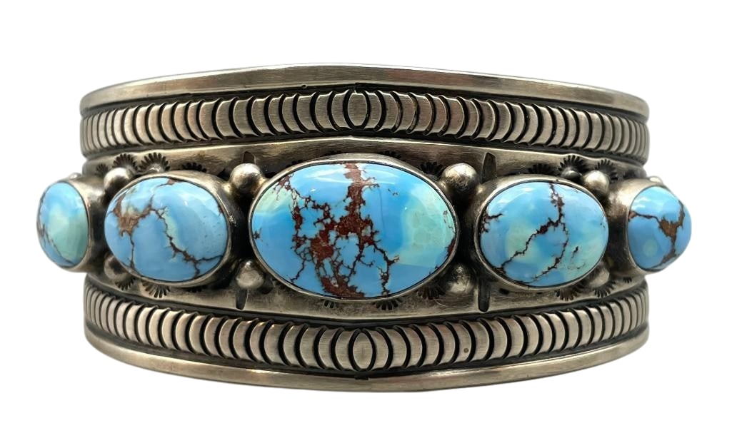 Hefty Sterling Silver And Golden Hills Turquoise Bracelet By Melvin Francis: For your bidding enjoyment we present a hefty sterling silver and Golden Hills turquoise bracelet by Melvin Francis. This bracelet features five (what we believe to be) Golden Hills turquoise cabochon