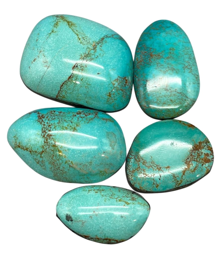 480 Carats Of Nevada Turquoise Cabochons: Offered here for your consideration are 480 carats of Nevada turquoise cabochons. This lot includes cut and polished light blue turquoise cabochons in various shapes and sizes. These would look gorgeo
