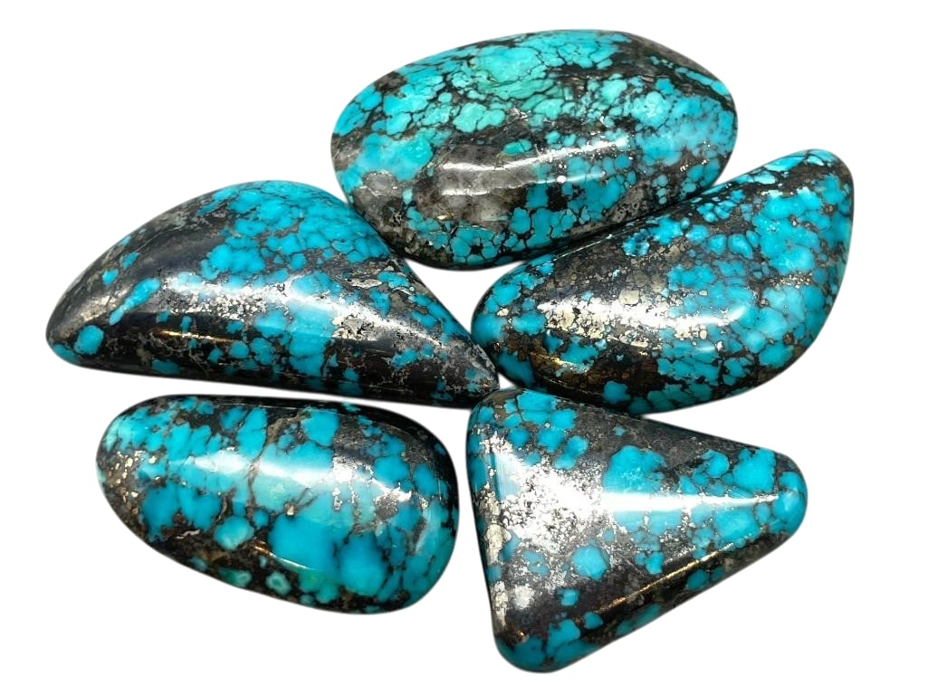 345 Carats Northern Nevada Turquoise Cabochons: Offered here for your consideration are 345 carats of Northern Nevada turquoise cabochons. This lot includes cut and polished dark blue turquoise cabochons in a variety of sizes and shapes with great 