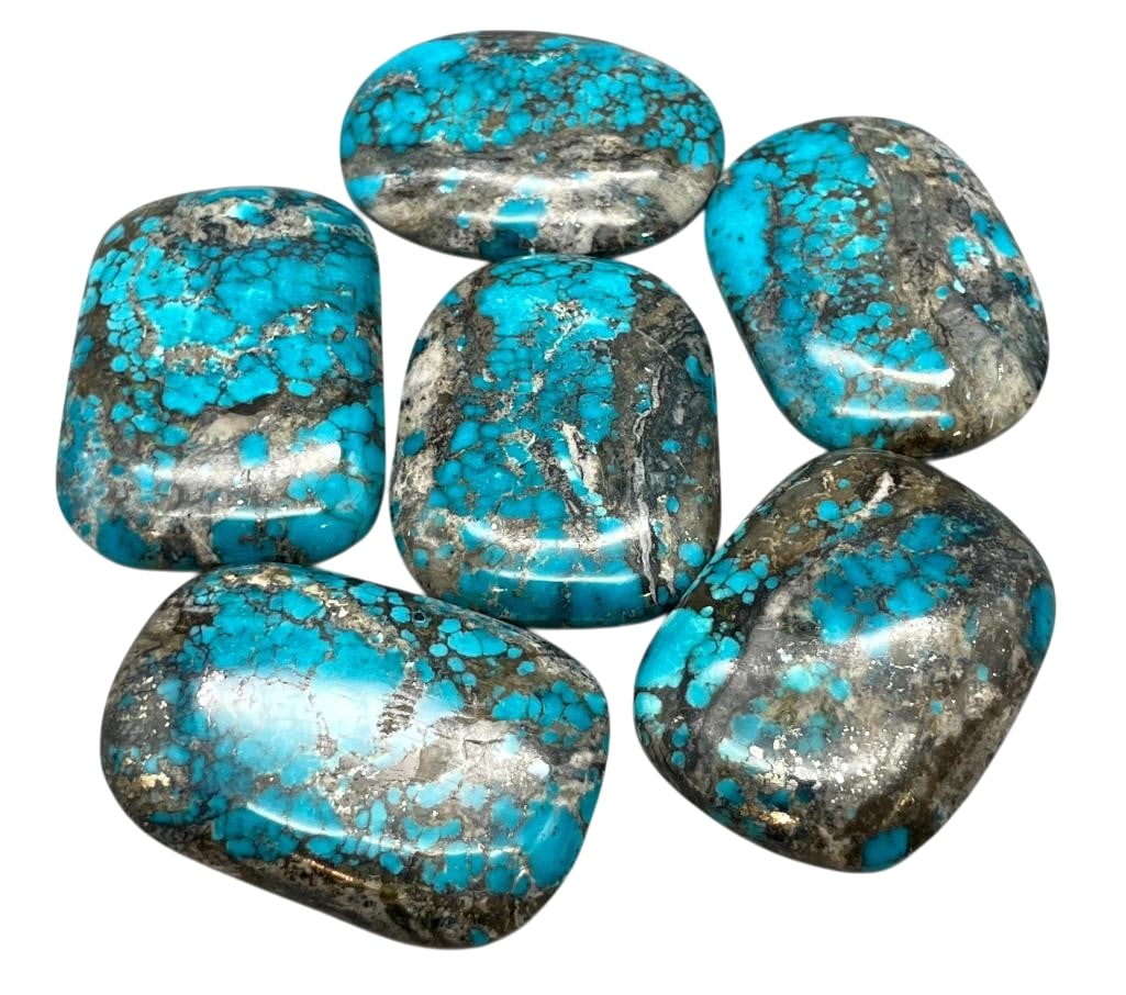 475 Carats High Grade Turquoise Cabochons: Offered here for your consideration are 475 carats of high grade turquoise cabochons. This lot includes cut and polished dark blue turquoise cabochons in various shapes and sizes with great matrix thr