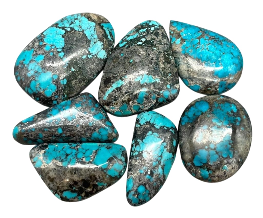 320 Carats High Grade Turquoise Cabochons: Offered here for your consideration are 320 carats of high grade turquoise cabochons. This lot includes cut and polished dark blue turquoise cabochons in various shapes and sizes with great matrix thr