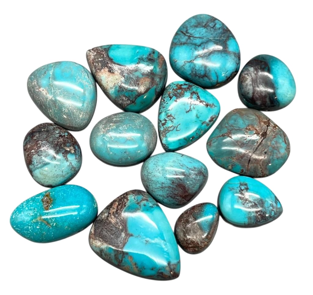 Approximately 100 Carats Of Bisbee Turquoise Cabochons: Offered here for your consideration are approximately 100 carats of Bisbee turquoise cabochons. These are cut and polished turquoise cabochons in a variety of sizes and shapes. The Bisbee mine is one 