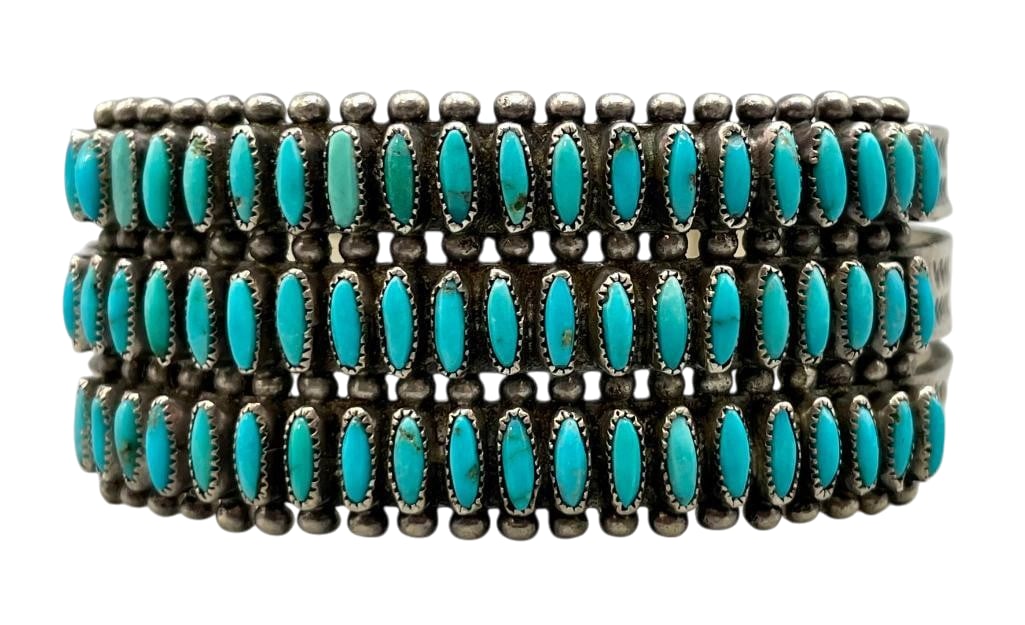 Vintage Sterling Silver And Turquoise Needlepoint Three Row Bracelet: Offered here for your consideration is a vintage sterling silver and turquoise needlepoint three row bracelet. This piece features three rows of needle point turquoise cabochons set in sawtooth silver