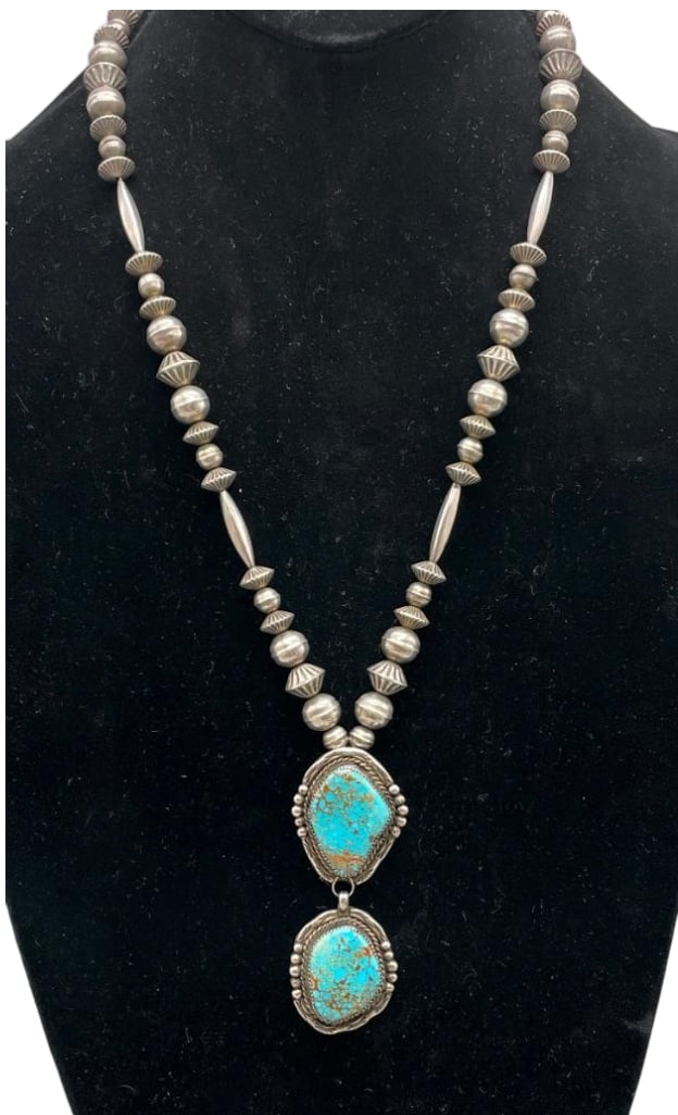 Sterling Bead Necklace With Fluted Cylinder, Melon, Round Beads and High Grade Turquoise Pendant: Offered here for your consideration is a sterling bead necklace with fluted cylinder, melon, round beads and high grade turquoise pendant. This piece features a pendant and matching dangle highlighted
