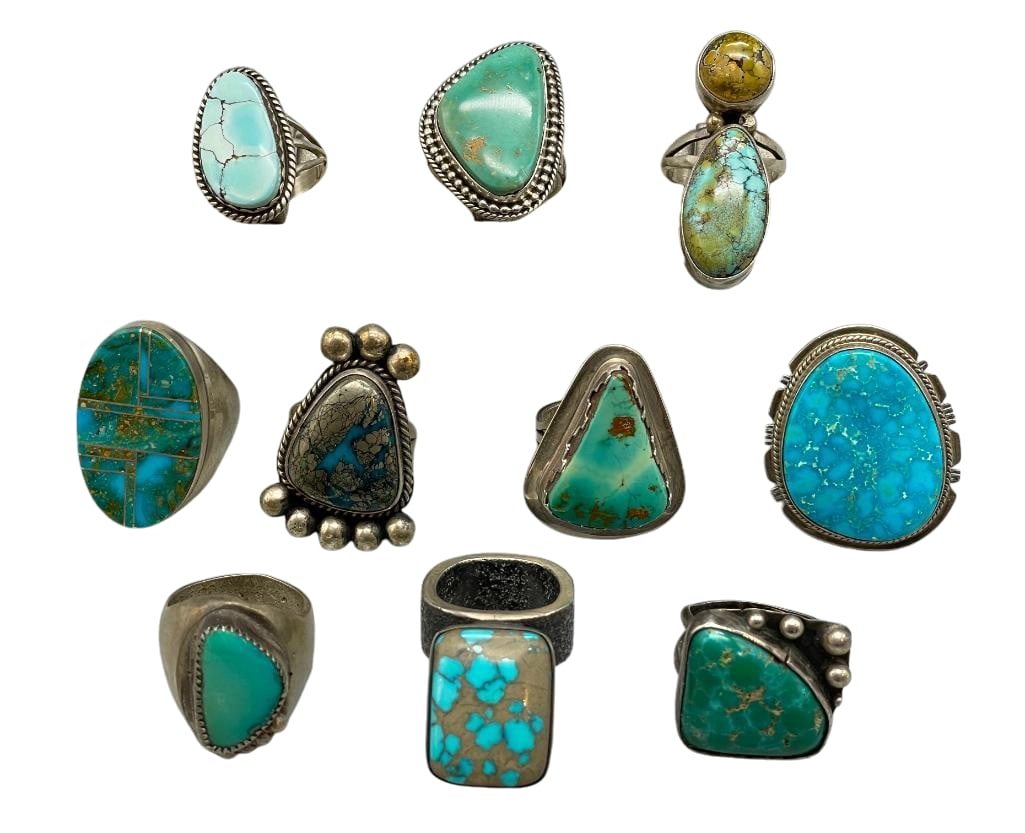 10 Sterling Silver And Turquoise Rings With Various Settings: Offered here are 10 sterling silver and turquoise rings with various settings. These lovely pieces are highlighted cabochons of turquoise or other stones set in silver bezels. The designs are accented