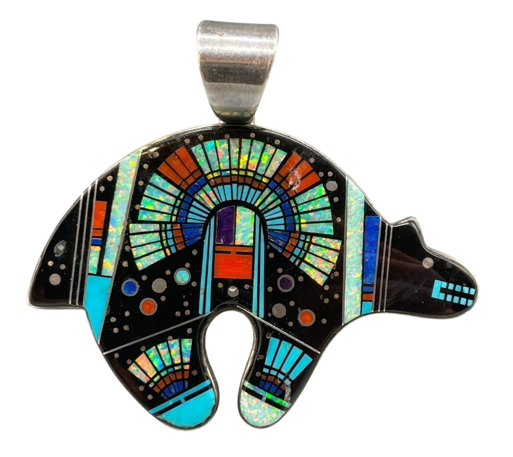Micro Inlay Multi Stone And Sterling Silver Bear Pendant By Melvin Francis: Offered here is a micro inlay multi stone and sterling silver bear pendant by Melvin Francis. This pendant features an inlay of turquoise, coral, onyx, opal and other stones with a central figural des