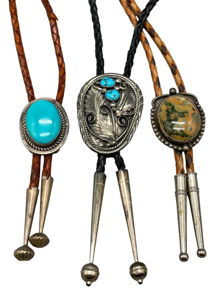 Three Sterling Silver Bolo Ties With Various Settings: Available here for your consideration are three sterling silver bolo ties with various settings. These slides each feature a cabochon of turquoise or other stones set in silver bezels. Accenting them