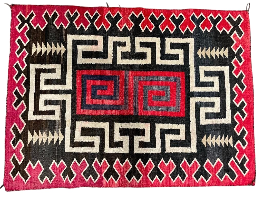 Non Regional Navajo Rug Circa 1920s-1930: Available here for your consideration is a non regional Navajo rug from circa the 1920s-1930s. It was woven with hand carded, hand spun wool and features interlocking Greek Key style designs framing t