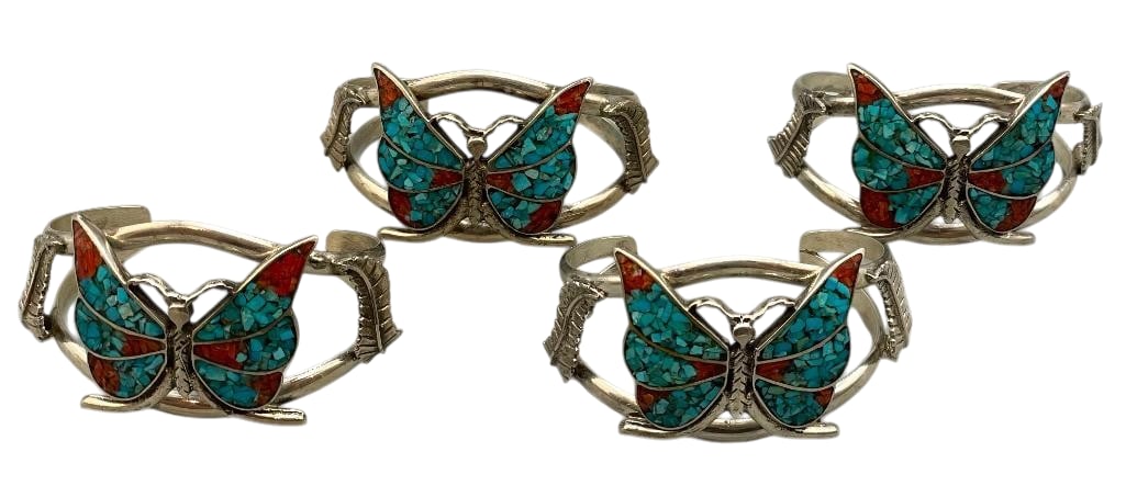 Four Sterling Silver, Turquoise And Coral Butterfly Motif Bracelets: Presented for your consideration are four sterling silver, turquoise and coral butterfly motif bracelets. Each bracelet features a central butterfly design created with turquoise and coral chip inlay.