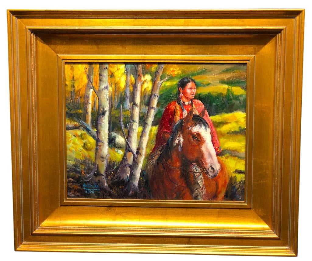 Plains Rider Original Oil On Canvas By Nadine Leo: Offered for your purchase here is an original oil on canvas by Nadine Leo featuring a female Plains rider in traditional attire on horseback riding through a treed landscape. This art is set in a gold