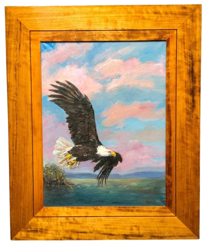 Bald Eagle In Flight Oil On Canvas By Nadine Leo: Offered for your purchase here is an original oil on canvas by Nadine Leo featuring an American Bald Eagle in flight with a cloudy sky in the background. This canvas is mounted in a stained wooden fra
