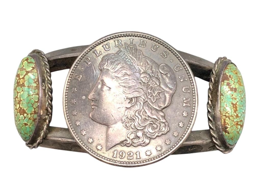 Sterling Silver Coin Theme And Green Turquoise Bracelet: Offered here for your consideration is a sterling silver coin theme and green turquoise bracelet. This piece features a Morgan Silver Dollar minted 1921 highlighted with two green turquoise cabochons 