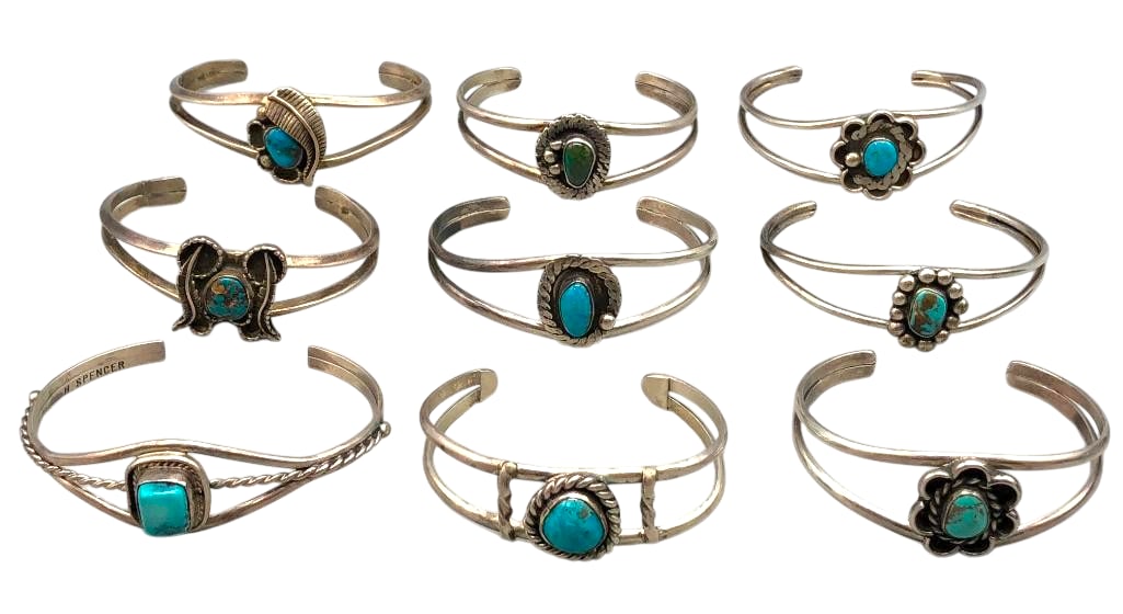 Group Of Nine Vintage Sterling Silver And Turquoise Bracelets With Various Designs: For your bidding pleasure we present a group of nine vintage sterling silver and turquoise bracelets with various designs. Each piece features a turquoise cabochon set in a smooth silver bezel. Accent