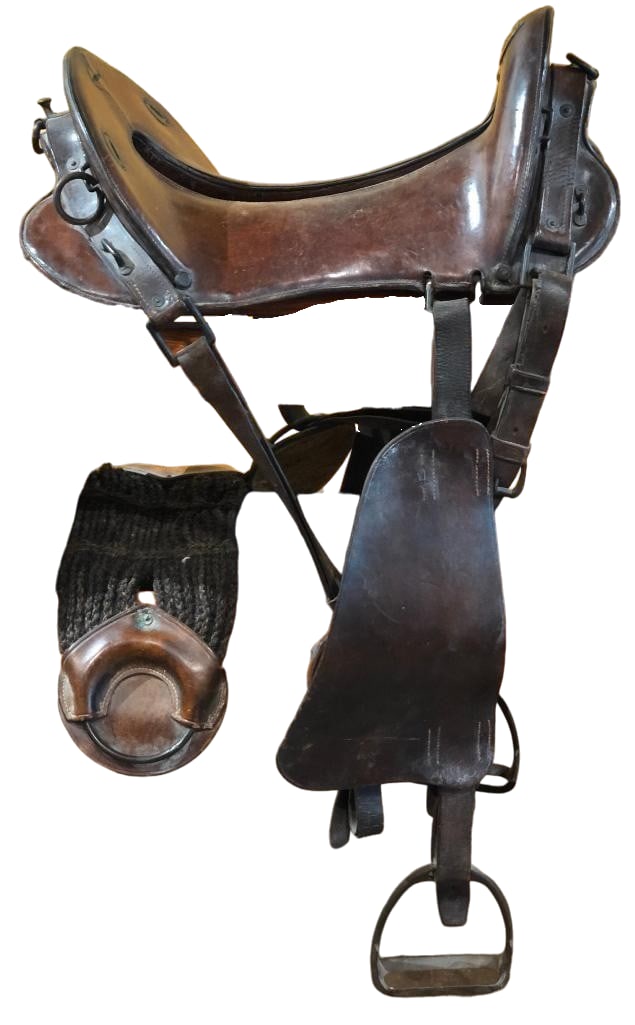 Antique McClellan Military Saddle: For your bidding pleasure we present an antique McClellan military style saddle. This brown leather saddle features an open seat with high pommel and cantle. It also has leather rigging, metal stirrup